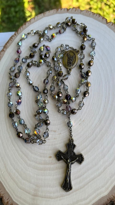 Handmade Catholic rosary with iridescent glass beads, metal crucifix, and religious medallion – perfect for prayer, First Communion, Confirmation, or thoughtful Catholic gifts.