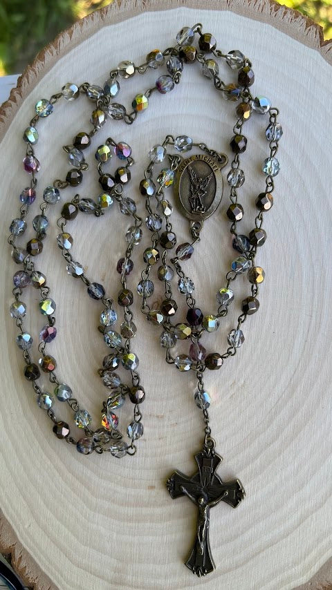 Handmade Catholic rosary with iridescent glass beads, metal crucifix, and religious medallion – perfect for prayer, First Communion, Confirmation, or thoughtful Catholic gifts.