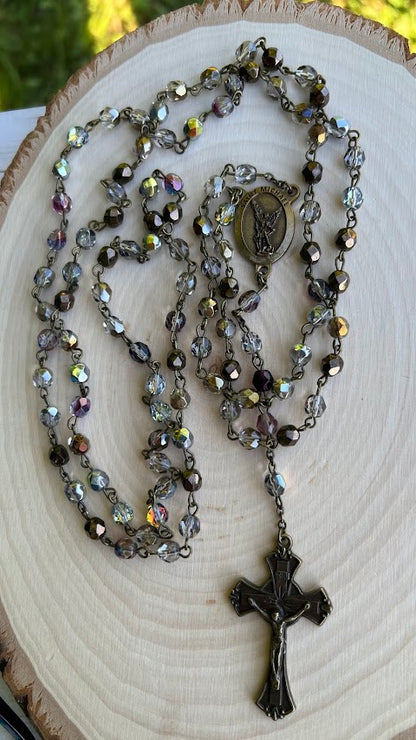 Handmade Catholic rosary with iridescent glass beads, metal crucifix, and religious medallion – perfect for prayer, First Communion, Confirmation, or thoughtful Catholic gifts.