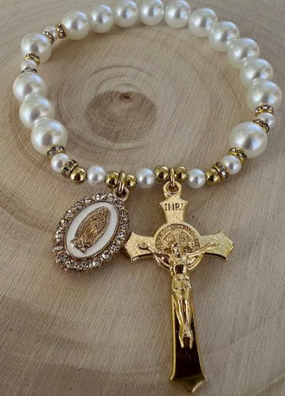 Women’s Catholic prayer bracelet with glossy pearl beads, golden accents, and Virgin Mary centerpiece charm
